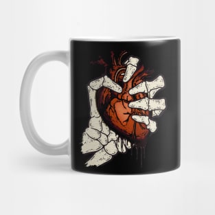 Skeleton Hand Squeezed Heart Mug